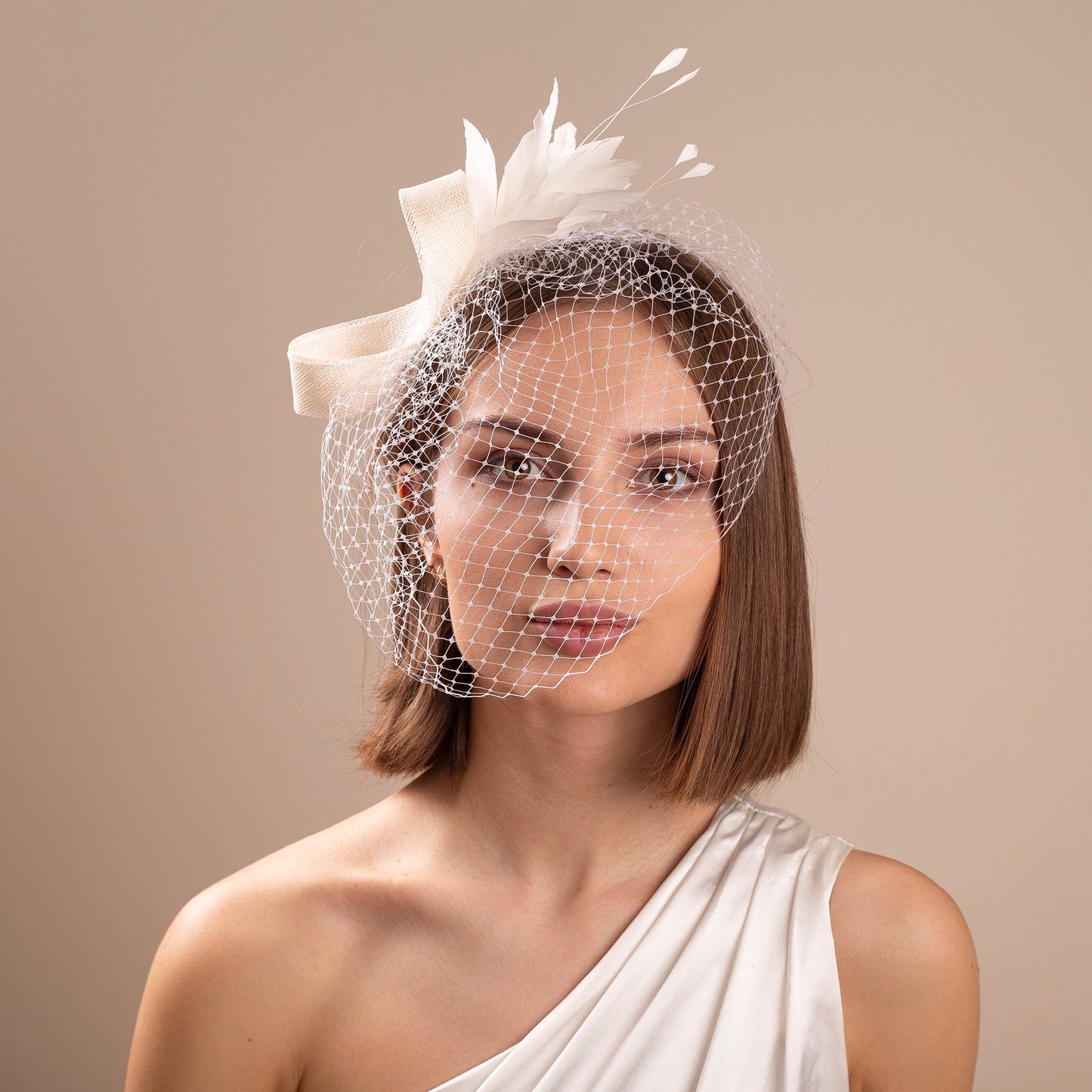 Modern bridal feather fascinator with birdcage, White wedding headpiece with birdcage veil, formal headpiece for bride