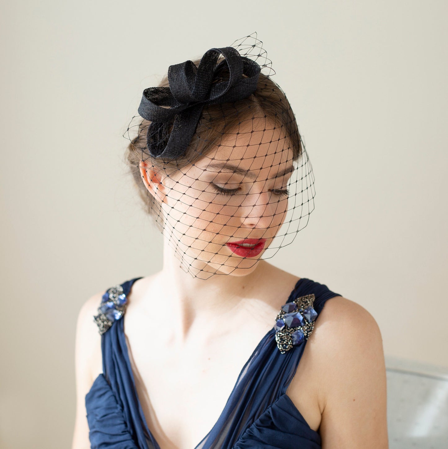 Modern bow fascinator with birdcage veil, veiled women fascinator, wedding guest headpiece in various colours