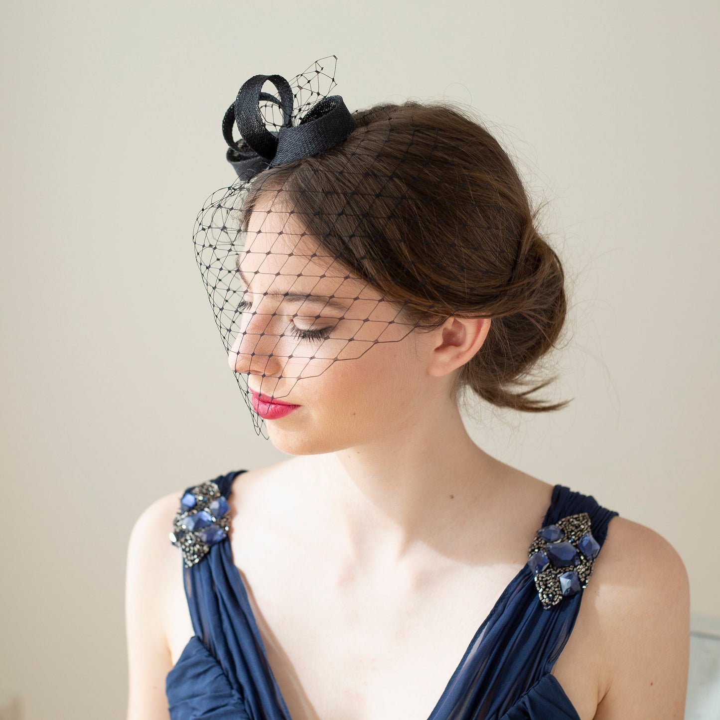 Modern bow fascinator with birdcage veil, veiled women fascinator, wedding guest headpiece in various colours