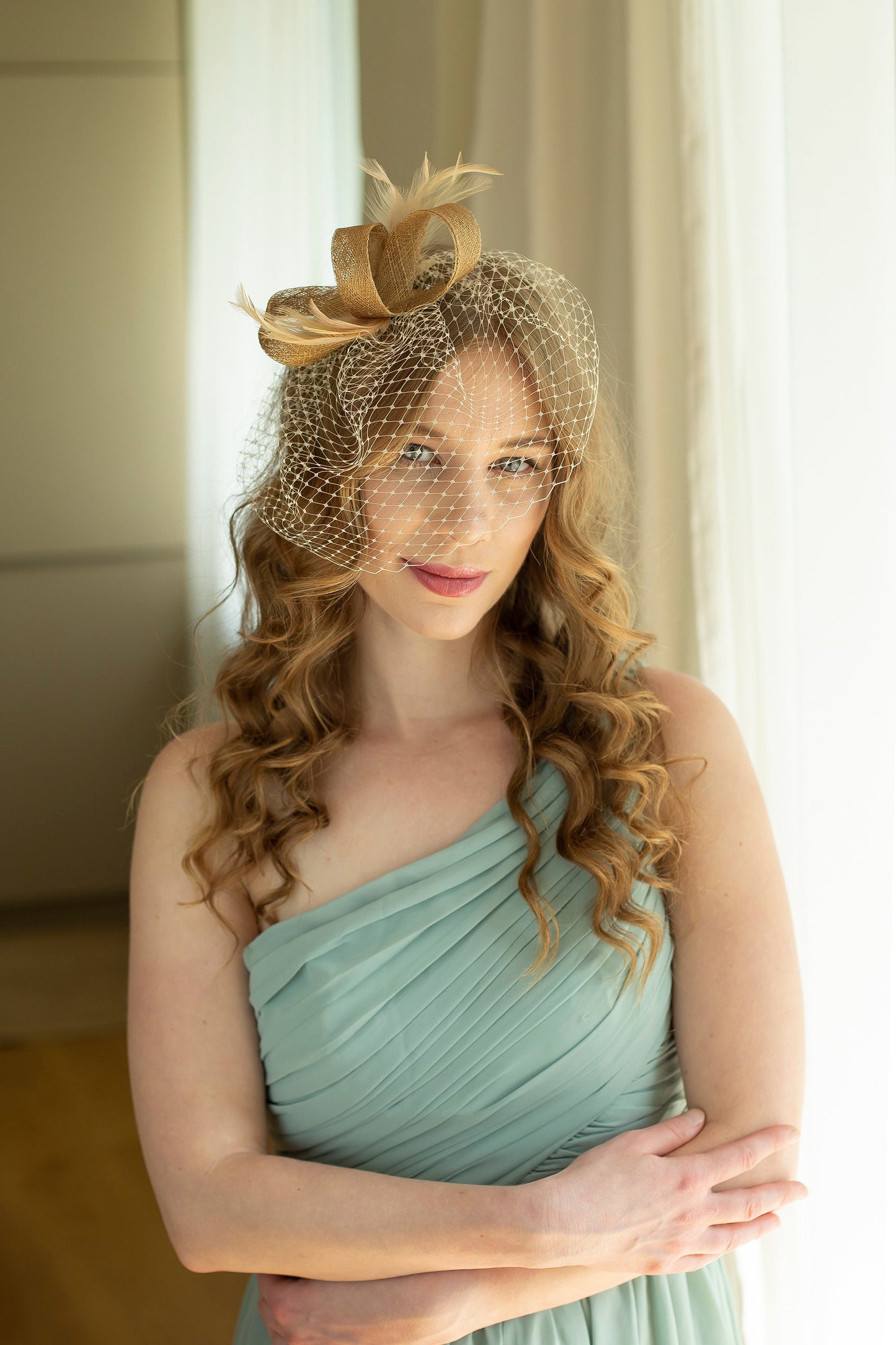 Gold fascinator with beige feathers and birdcage  veil, gold wedding guest fascinator, modern millinery headpiece