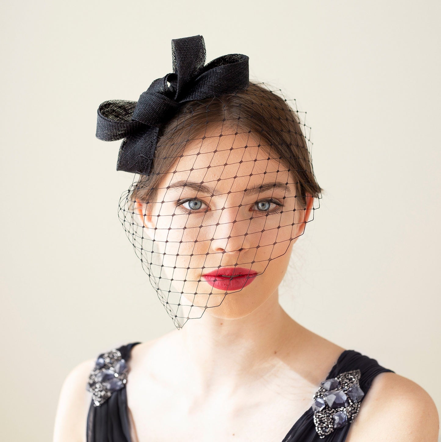 Modern bow fascinator with birdcage veil, veiled women fascinator, wedding guest headpiece in various colours