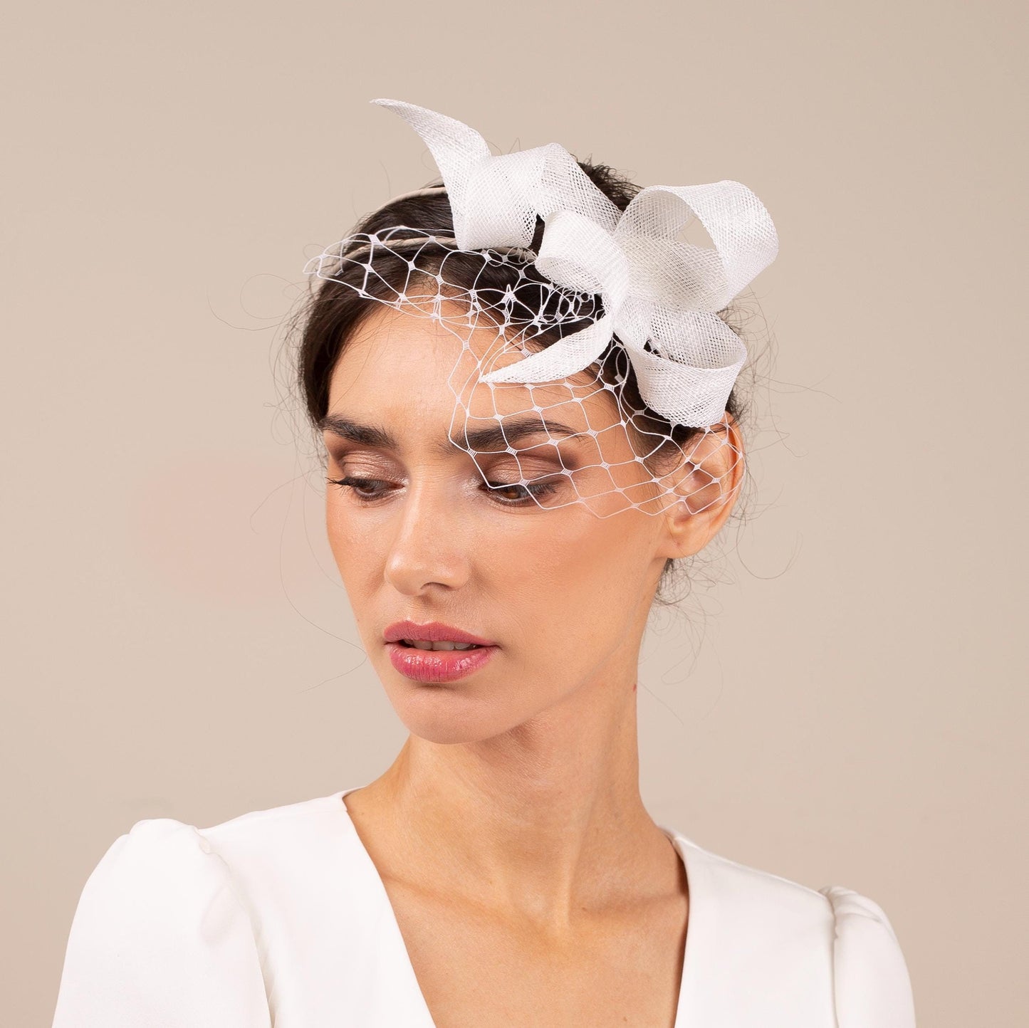 Bridal swirl bow fascinator with veiling, wedding headpiece on a comfortable double headband, large bow fascinator with veiling