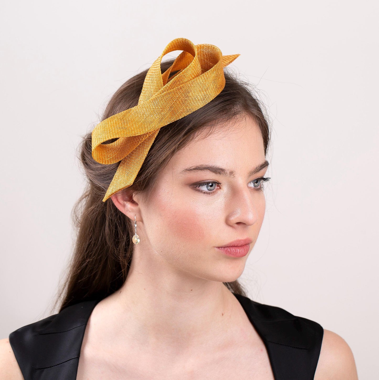 Marigold bow fascinator on comfortable headband, elegant party headpiece in ochre gold, feminine formal headpiece gold shadow