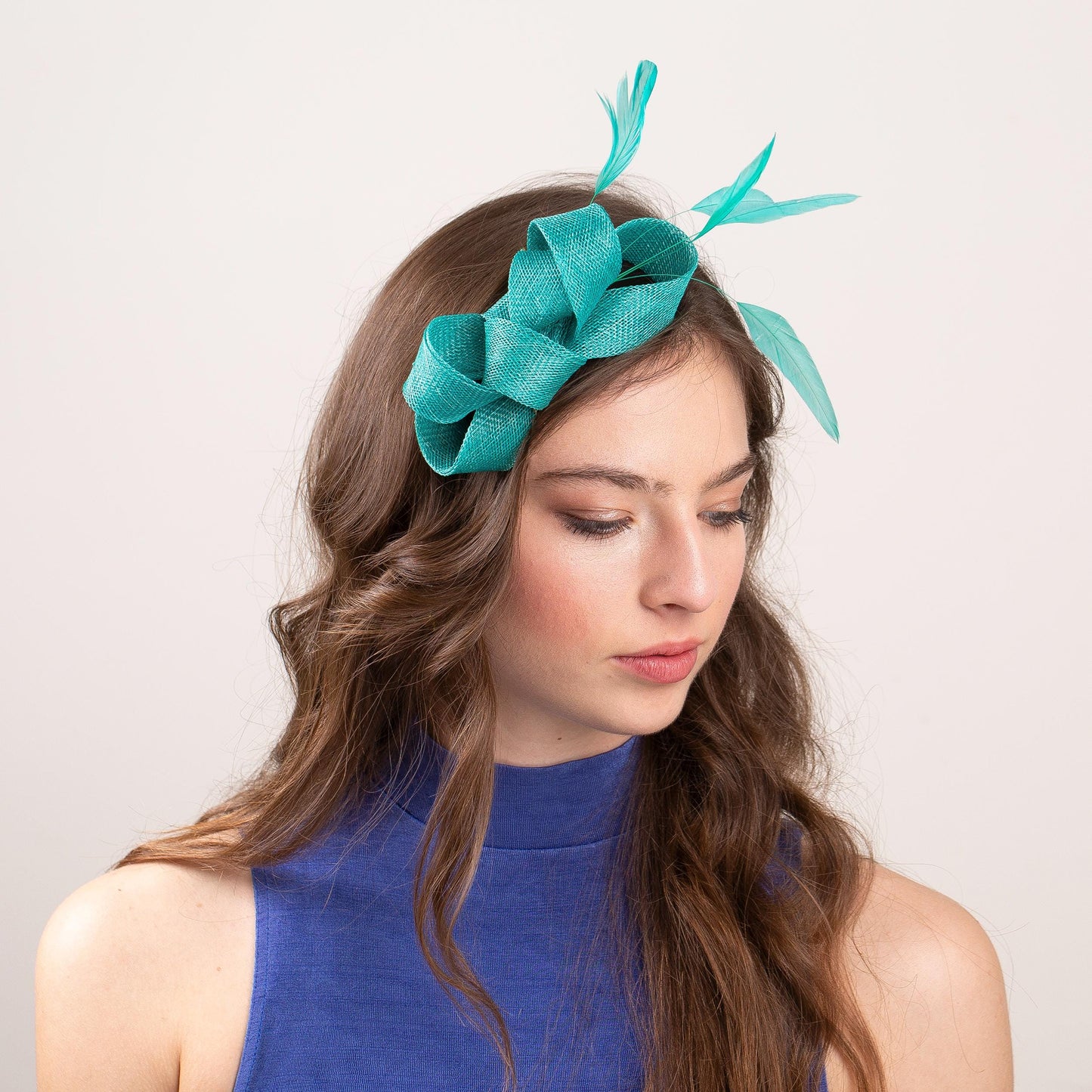 Large bow fascinator with feathers in Jade green wedding guest headpiece, jade feathers fascinator for elegant mother of bride formal event