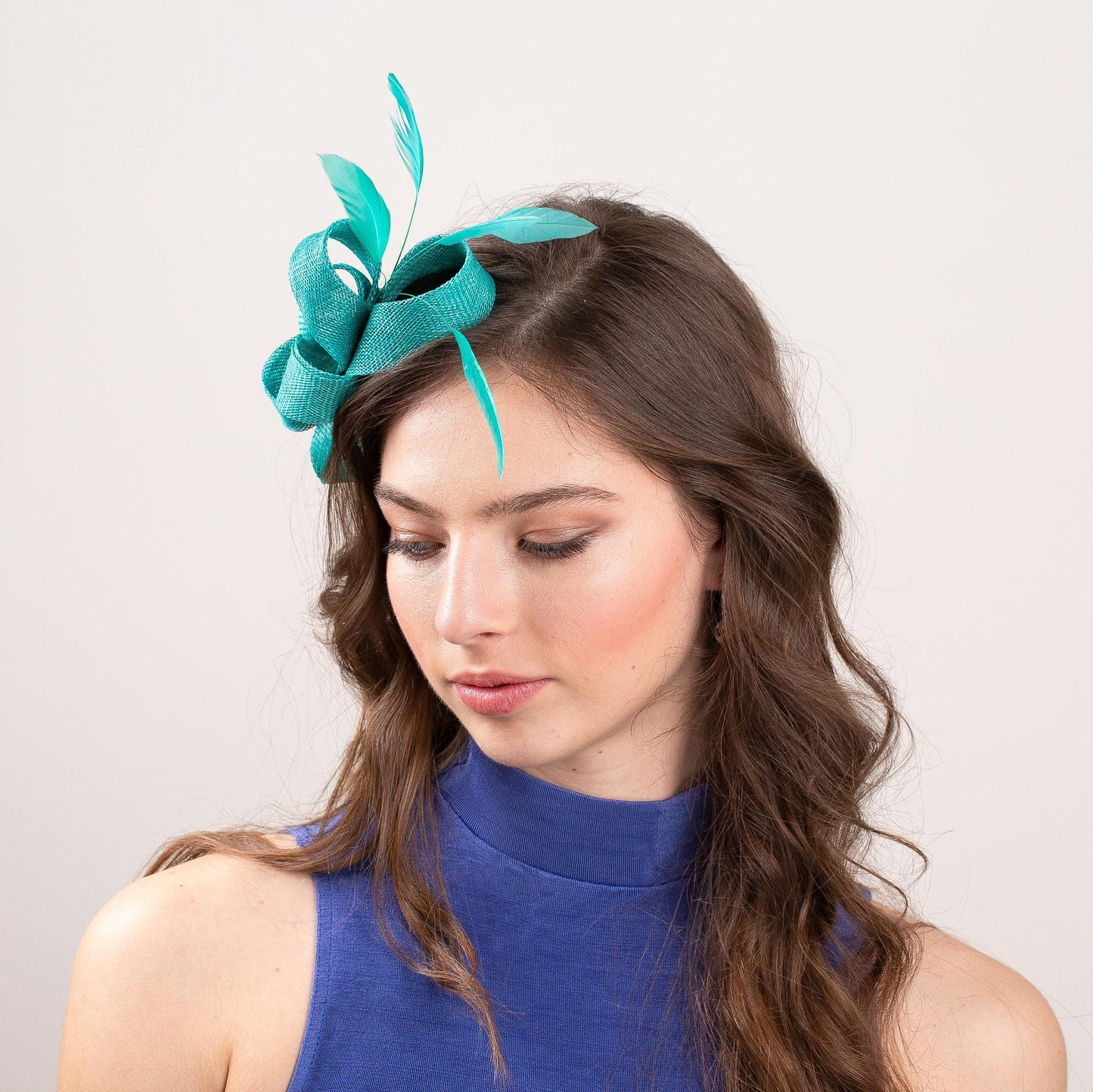 Large bow fascinator with feathers in Jade green wedding guest headpiece, jade feathers fascinator for elegant mother of bride formal event