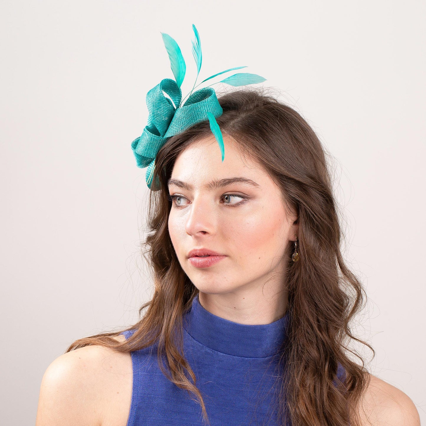 Large bow fascinator with feathers in Jade green wedding guest headpiece, jade feathers fascinator for elegant mother of bride formal event